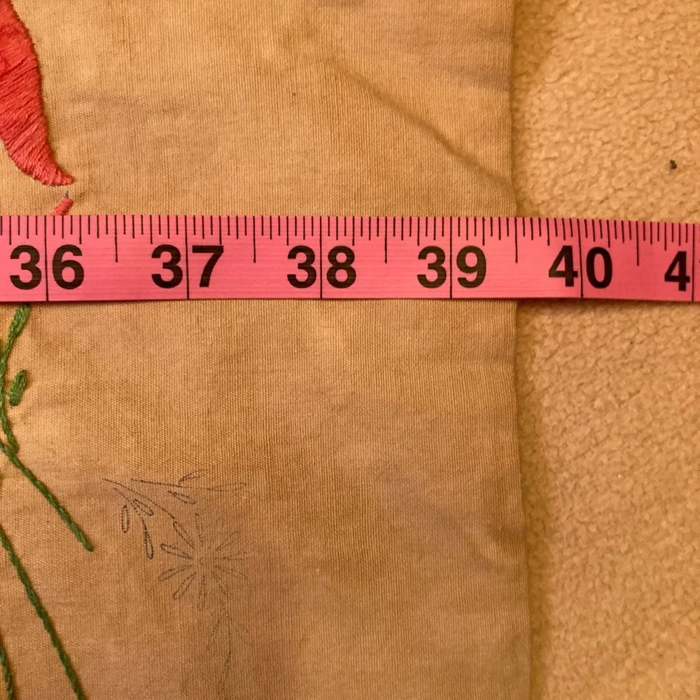 Vintage embroidery muslin, three corners begun, one ink outline blue pink red